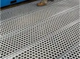 Grattugiato in acciaio perforato